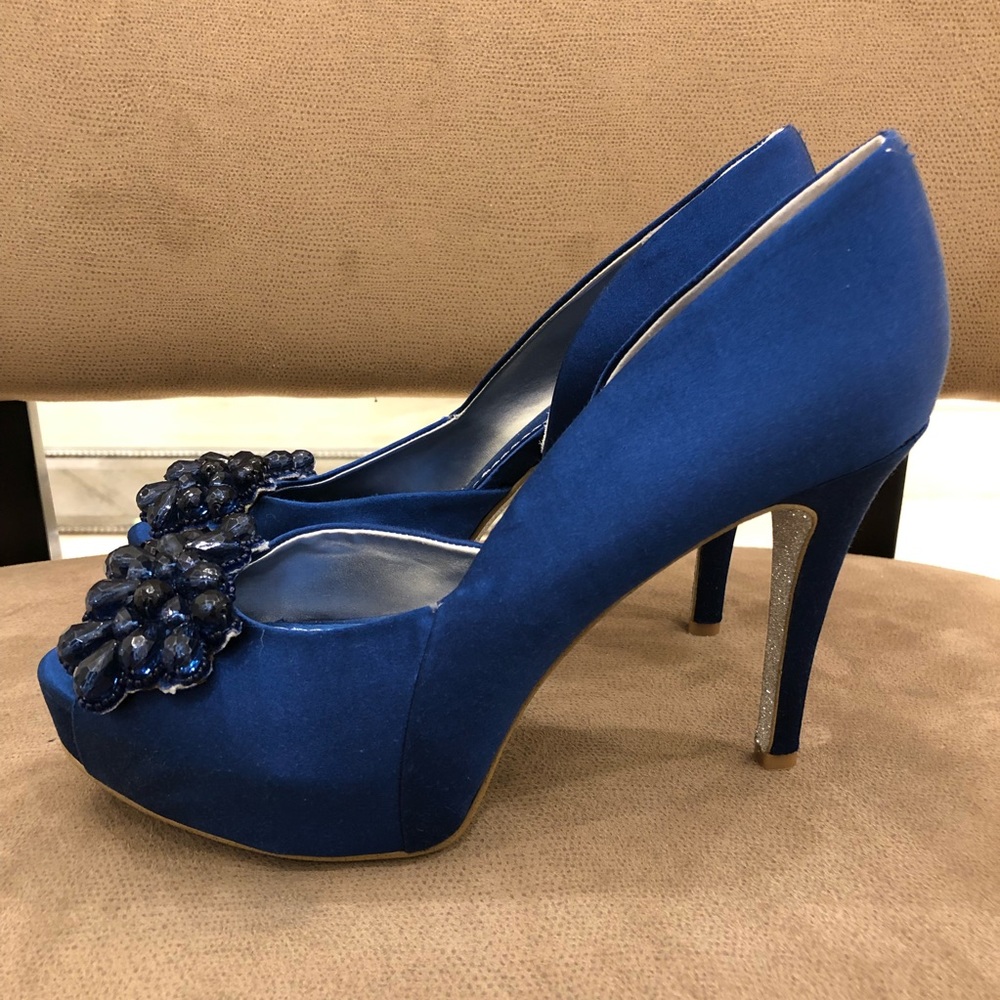 Nine West royal blue peep toe platform pumps